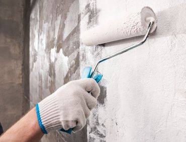commercial painting contractor painting interior wall in Fort Lauderdale, FL